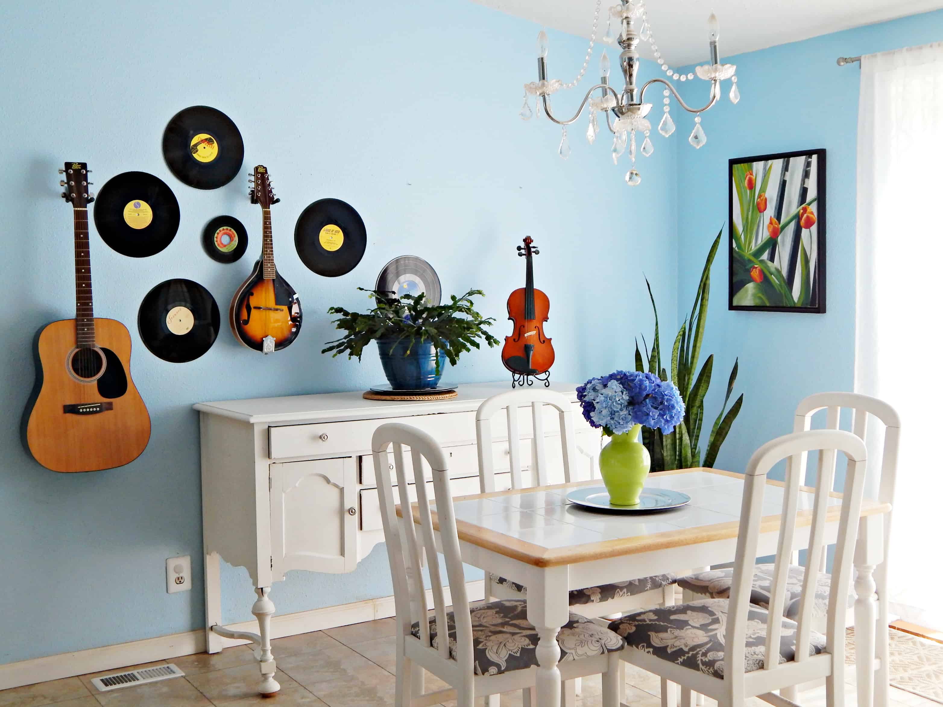 dining room wall with vinyl records as art