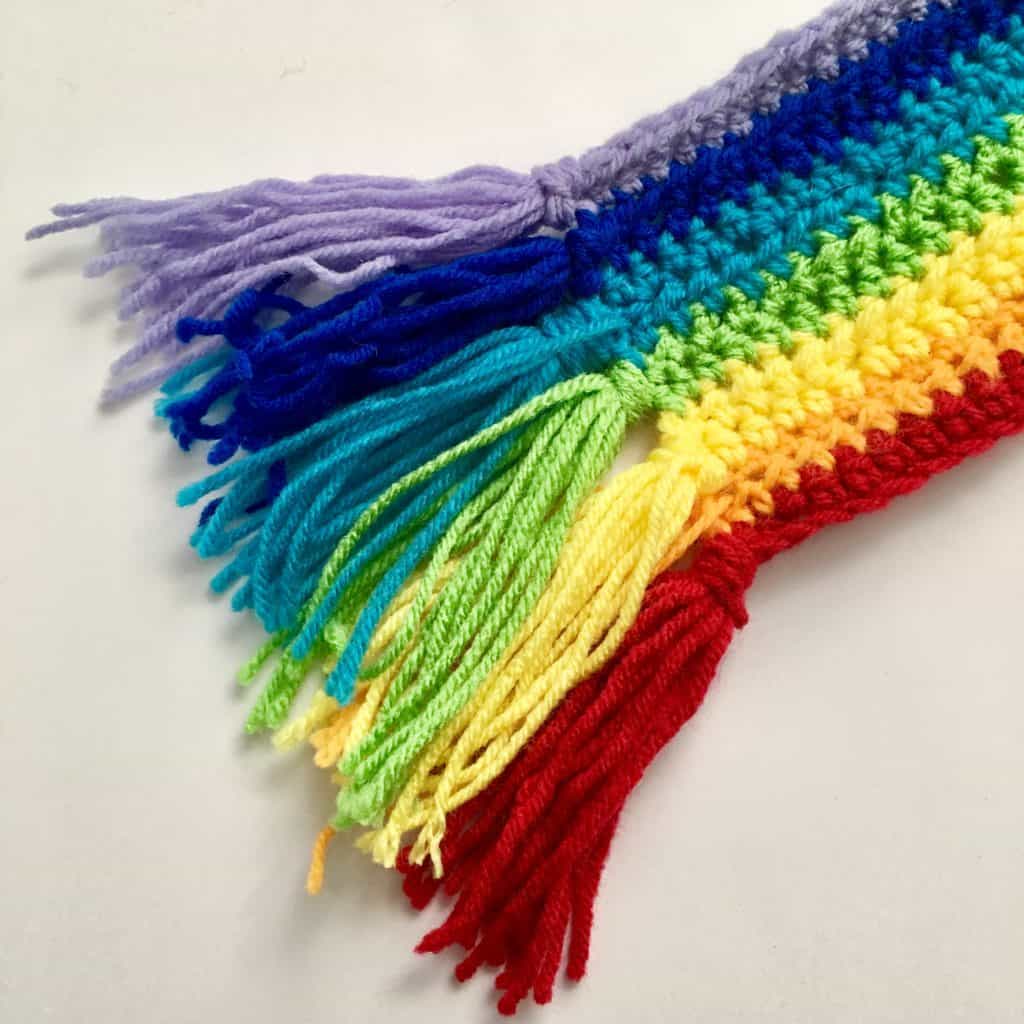 rainbow crochet scarf with frayed ends