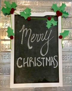 Merry Christmas written on chalkboard