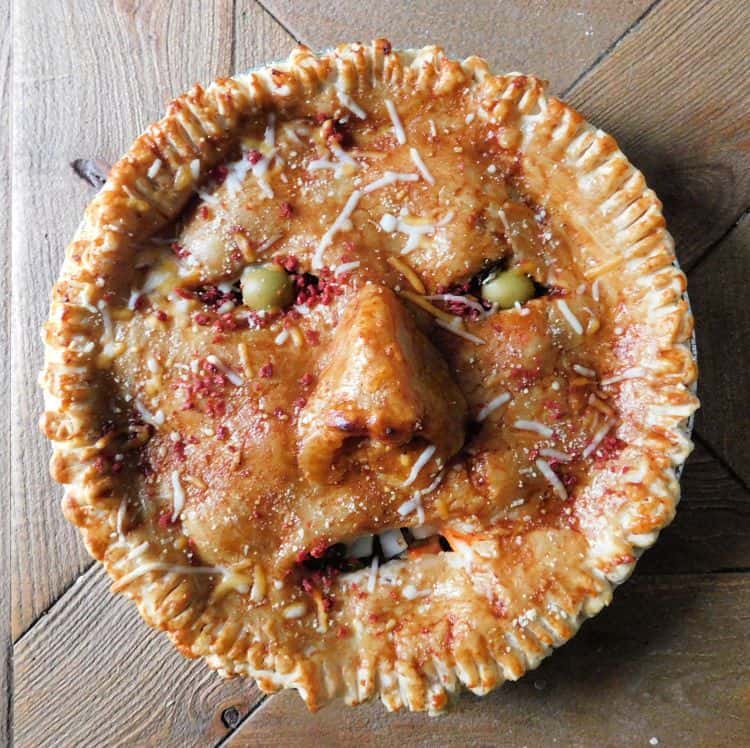 baked people pot pie with onion teeth
