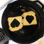 bread with heart shape cut out in pan