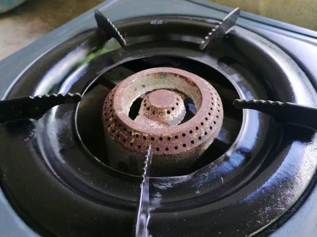 After feature image of how to clean cast iron stove grates.