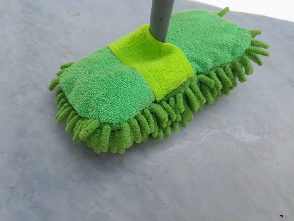 Mopping process on how to clean marble floors.