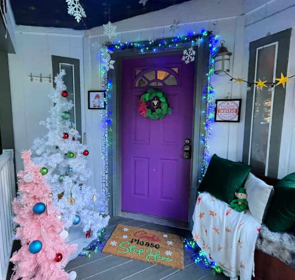 Front porch decorated for Christmas.