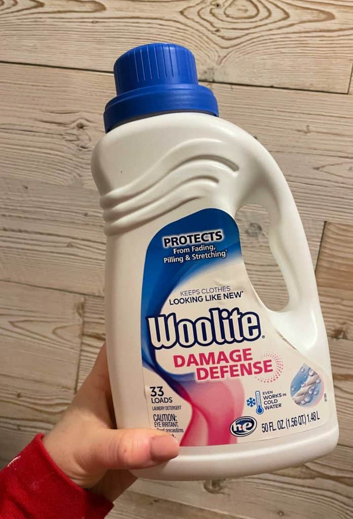 Woolite detergent for washing a silk fabric pillow case.